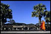 Monks walking inside the temple area of Angkor Wat. Siem Riep, Angkor, Cambodia