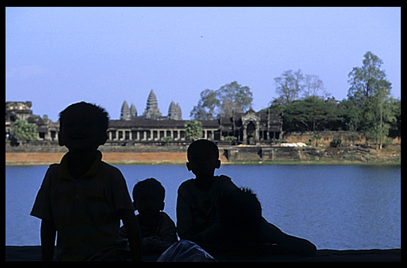 Silhouettes in front of Angkor Wat.