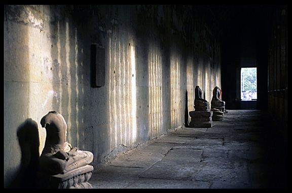 Buddha statues inside Angkor Wat.