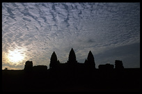 Silhouettes of the towers of Angkor Wat at sunset. Siem Riep, Angkor, Cambodia