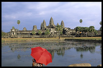 A red umbrella in front of Angkor Wat. Siem Riep, Angkor, Cambodia