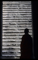 Silhouette of a monk inside Angkor Wat. Siem Riep, Angkor, Cambodia