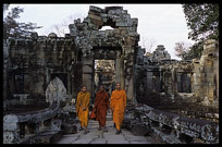 Buddhist monks inside Banteay Kdei. Siem Riep, Angkor, Cambodia