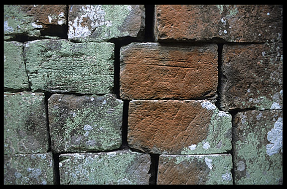 Detail of a weather beaten wall inside Banteay Kdei.