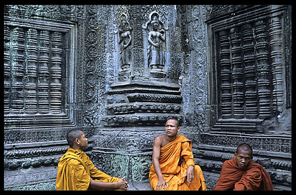 Resting monks inside Ta Phrom.
