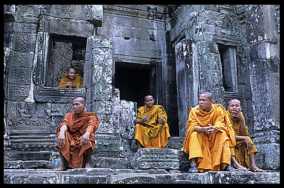 Resting monks inside the Bayon, Angkor Thom.