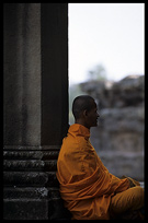 A resting monk inside Angkor Wat. Siem Riep, Angkor, Cambodia