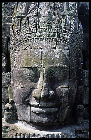 Close up of one of the many smiling faces in the Bayon, Angkor Thom.