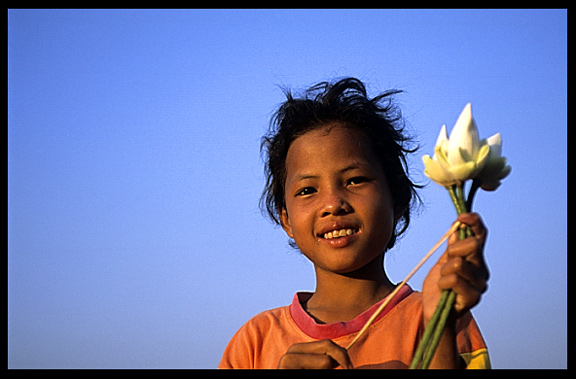 A Cambodian girl sells flowers at the riverfront in Phnom Penh.