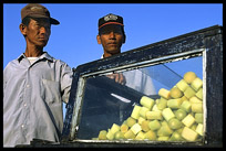 Two local salespeople at Phnom Penh's riverfront.