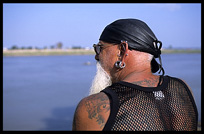 An English tourist is enjoying the view of the Mekong at Phnom Penh's riverfront.