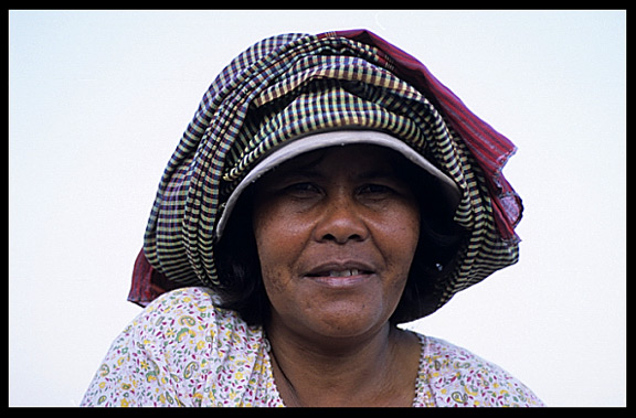 Portrait of a Cambodian woman at Phnom Penh's riverfront.