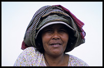 Portrait of a Cambodian woman at Phnom Penh's riverfront.