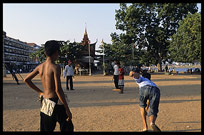 Cambodian children are playing a gambling game with flip flops, Phnom Penh. Cambodia