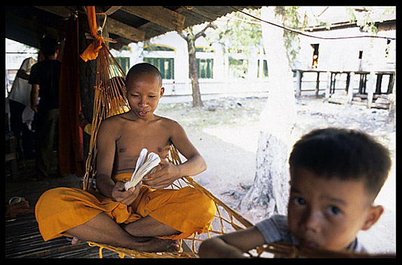 Monks inside Wat Nokor, near Kompong Cham.