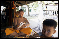 Monks inside Wat Nokor, near Kompong Cham.