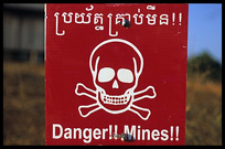 Danger!! Mines!! Village near Ban Lung. Ban Lung, Ratanakiri, Cambodia