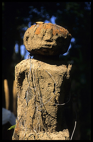 Tompuon cemetery with wooden statues resembling the deceased in the forest of Kachon, Cambodia