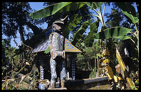 Tompuon cemetery with wooden statues resembling the deceased in the forest of Kachon, Cambodia