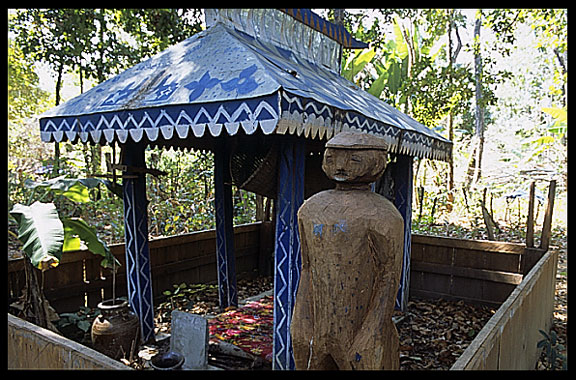 Tompuon cemetery with wooden statues resembling the deceased in the forest of Kachon, Cambodia