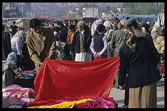 Silk for sale at the Sunday Market. Kashgar, Xinjiang, China