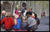 Uyghur people on a horse-cart. Hotan, Xinjiang, China