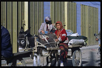 Uyghur people on a donkey-cart. Hotan, Xinjiang, China