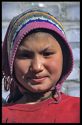 Portrait of Uyghur girl. Hotan, Xinjiang, China