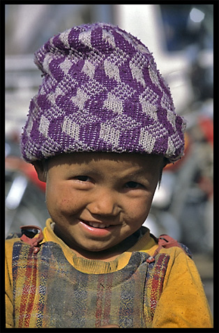 Portrait of Uyghur girl. Hotan, Xinjiang, China