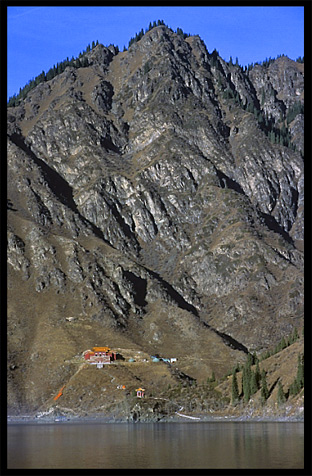 Temple across Heaven Pool or Heavenly Lake (Tian Chi). Urumqi, Xinjiang, China