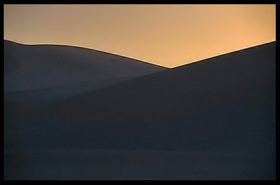 Towering sand dunes at Crescent Moon Lake (Yueyaquan). Dunhuang, Gansu, China