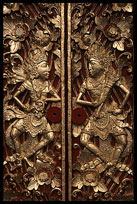 Amazing wood carved doors in the streets of Ubud displaying religious figures.
