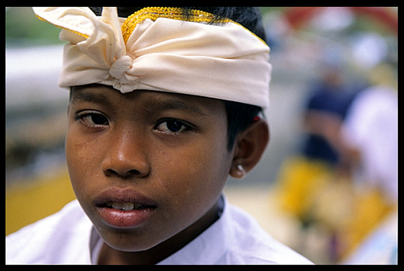 A Balinese boy traditionally dressed up in Amlapura.