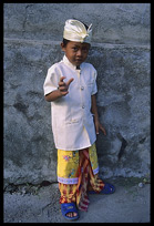 A young balinese in traditional clothing.