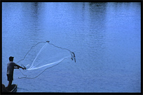 Fishing at sunrise on the four thousand islands. Si Phan Don, Don Det, Laos