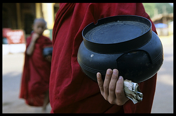 Young monks praying for money in Bago.