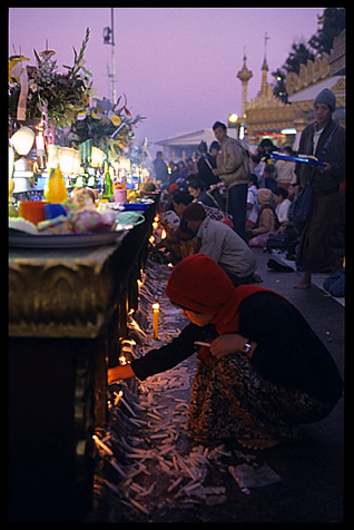 Magic and devotion at the incredible balancing boulder stupa in Kyaiktiyo.