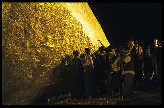 Magic and devotion at the incredible balancing boulder stupa in Kyaiktiyo at midnight.