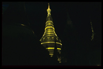 The golden dome of Shwedagon Paya at night.