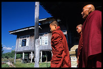 Monks walking by in monastery in Nanthe village near Nyaungshwe.