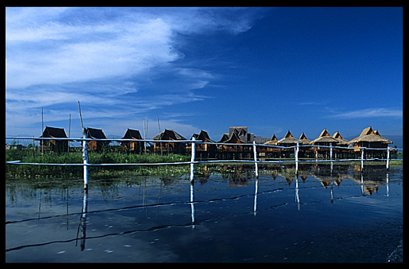 lts on the Inle Lake, floating vegetable gardens in the foreground.