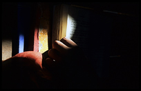  A young monk studying in an 18th-century wooden monastery, Shwe Yaunghwe Kyaung.