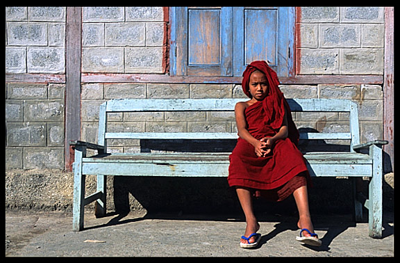 A young monk resting at Shwe Yaunghwe Kyaung, an 18th-century wooden monastery near Inle Lake.