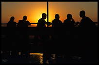 Silhouettes of monks during sunset at Mandalay Hill.