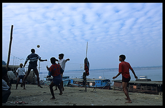 Playing Chinlon at the Ayeyarwady riverfront.