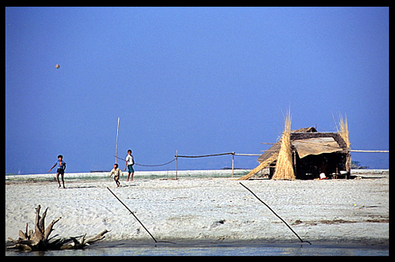 Playing Chinlon at the Ayeyarwady riverfront.