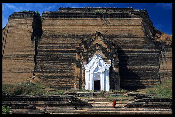 A monk walking down the Mingun Paya.