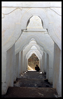 A monk at Hsinbyume Paya in the ancient city Mingun.