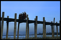 Monks crossing the U Bein Bridge at Amarapura.