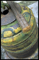 Detail of a bell in a Buddhist monastery in Mandalay.